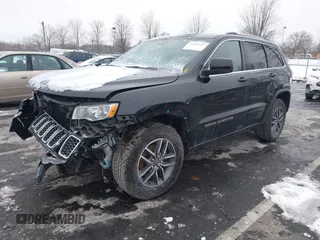 2019 Jeep Grand Cherokee Laredo E with VIN 1C4RJFAGXKC834233, listed as a IAAI auction lot 41392437 with 81,005 mi miles. Bid and sale history available at carsss.com. Image 19.