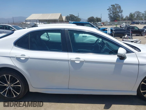 2018 Toyota Camry LE with VIN 4T1B11HK5JU007856, listed as a IAAI auction lot 42531732 with 121,020 mi miles and . Bid and sale history available at DreamBid. Image 14.