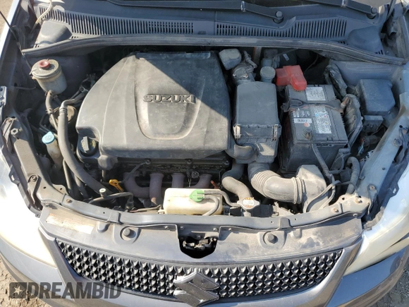 2010 Suzuki SX4 with VIN JS2YB5A24A6300249, listed as a Copart auction lot 71565394 with 291,886 mi miles and Salvage Title. Bid and sale history available at DreamBid. Image 11.