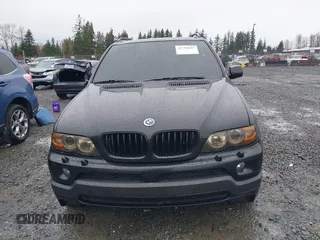 2005 BMW X5 4.8is with VIN 5UXFA93515LE82570, listed as a IAAI auction lot 41759657 with 212,687 mi miles. Bid and sale history available at carsss.com. Image 12.