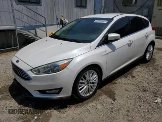 2015 Ford Focus Titanium с VIN 1FADP3N23FL375368, выставлен на аукционе Copart как лот 60707305 с пробегом 153 300 миль миль и Чистый • Clean title. История ставок и продаж доступна на DreamBid. Изображение 1.