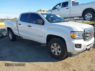 2015 GMC Canyon 2WD with VIN 1GTG5AE39F1140916, listed as a IAAI auction lot 41298357 with 96,050 mi miles and . Bid and sale history available at DreamBid. Image 1.