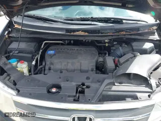 2013 Honda Odyssey Touring with VIN 5FNRL5H92DB003200, listed as a IAAI auction lot 41920237 with 167,483 mi miles. Bid and sale history available at carsss.com. Image 10.
