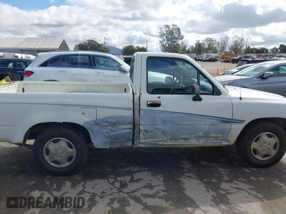 1992 Toyota Pickup DLX z VIN 4TARN81PXNZ004395, wystawiony jako IAAI lot #41729264 z przebiegiem 137 289 mil mil oraz . Historia ofert i sprzedaży dostępna na DreamBid. Obrazek 13.