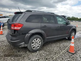 2017 Dodge Journey SE z VIN 3C4PDCAB1HT709104, wystawiony jako Copart lot #57132935 z przebiegiem 89 024 mil mil oraz Szkoda całkowita • Salvage title. Historia ofert i sprzedaży dostępna na DreamBid. Obrazek 3.