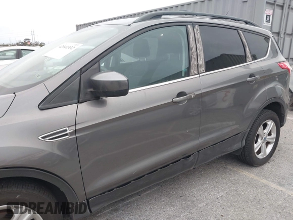 2013 Ford Escape SE with VIN 1FMCU0GX7DUA86521, listed as a IAAI auction lot 42041532 with 108,776 mi miles and . Bid and sale history available at DreamBid. Image 6.