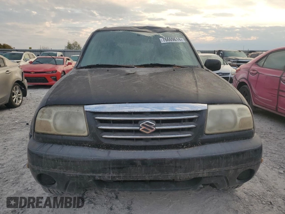 2001 Suzuki XL7 Standard z VIN JS3TX92V514102993, wystawiony jako Copart lot #76669614 z przebiegiem 65 789 mil mil oraz Szkoda całkowita • Salvage title. Historia ofert i sprzedaży dostępna na DreamBid. Obrazek 5.