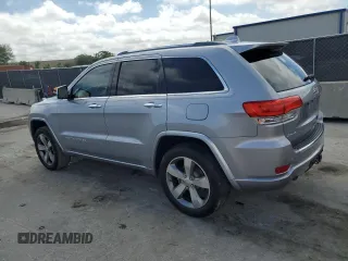 2014 Jeep Grand Cherokee Overland with VIN 1C4RJFCG1EC216154, listed as a Copart auction lot 50984675 with 91,782 mi miles and Salvage Title. Bid and sale history available at carsss.com. Image 2.
