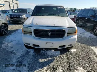 1999 Cadillac Escalade z VIN 1GYEK13R3XR406970, wystawiony jako Copart lot #87623365 z przebiegiem 189 339 mil mil oraz Szkoda całkowita • Salvage title. Historia ofert i sprzedaży dostępna na DreamBid. Obrazek 12.
