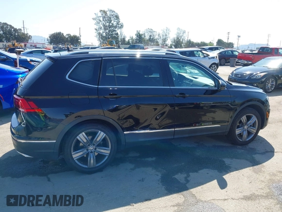 2021 Volkswagen Tiguan SE with VIN 3VV3B7AX1MM045478, listed as a IAAI auction lot 41947899 with 56,694 mi miles and . Bid and sale history available at DreamBid. Image 13.