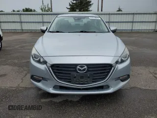 2018 Mazda 3 Touring z VIN 3MZBN1V38JM206424, wystawiony jako Copart lot #57914015 z przebiegiem 93 095 mil mil oraz Szkoda całkowita • Salvage title. Historia ofert i sprzedaży dostępna na DreamBid. Obrazek 5.