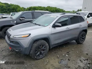 2018 Jeep Cherokee Trailhawk Leather Plus z VIN 1C4PJMBX1JD512857, wystawiony jako Copart lot #58730535 z przebiegiem 104 252 mil mil oraz Tytuł czysty. Historia ofert i sprzedaży dostępna na DreamBid. Obrazek 1.