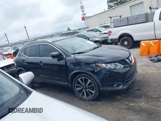 2017 Nissan Rogue S z VIN JN1BJ1CP9HW019565, wystawiony jako IAAI lot #42121059 z przebiegiem 106 056 mil mil oraz . Historia ofert i sprzedaży dostępna na DreamBid. Obrazek 13.