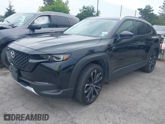 2023 Mazda CX-50 Meridian Edition with VIN 7MMVABXY1PN145913, listed as a IAAI auction lot 42632620 with 23,444 mi miles and . Bid and sale history available at DreamBid. Image 17.