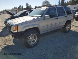 1997 Jeep Grand Cherokee Limited with VIN 1J4GZ78Y5VC598822, listed as a Copart auction lot 74306474 with 276,454 mi miles and Salvage Title. Bid and sale history available at carsss.com. Image 1.