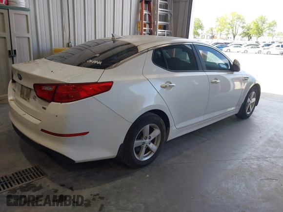 2015 Kia Optima LX z VIN KNAGM4A79F5528215, wystawiony jako IAAI lot #42317163 z przebiegiem 215 395 mil mil oraz . Historia ofert i sprzedaży dostępna na DreamBid. Obrazek 4.