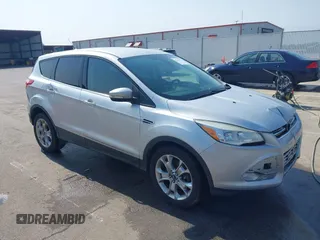 2013 Ford Escape SEL with VIN 1FMCU9H99DUA11243, listed as a IAAI auction lot 42356731 with 154,937 mi miles and . Bid and sale history available at DreamBid. Image 1.