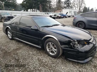 1997 Ford Thunderbird LX with VIN 1FALP62W1VH110468, listed as a Copart auction lot 88331705 with 84,349 mi miles and Salvage Title. Bid and sale history available at DreamBid. Image 4.