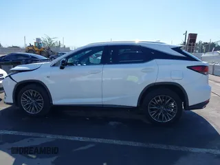 2021 Lexus RX with VIN 2T2SZMDA8MC289158, listed as a IAAI auction lot 41403874 with 84,981 mi miles. Bid and sale history available at carsss.com. Image 14.