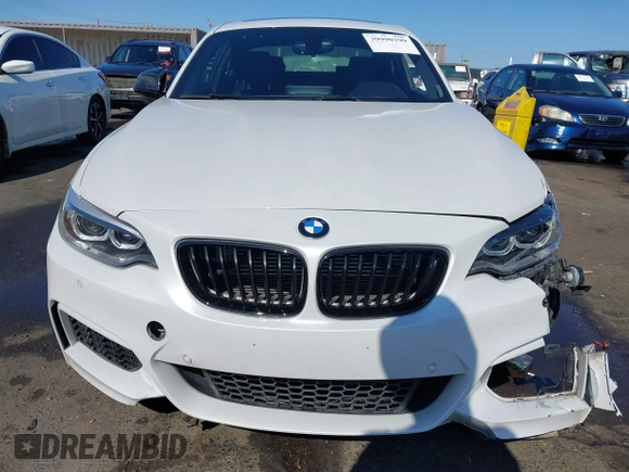 2016 BMW 2 Series M235i with VIN WBA1J7C5XGV359562, listed as a IAAI auction lot 39990299 with 54,022 mi miles. Bid and sale history available at carsss.com. Image 12.