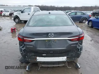 2020 Mazda 6 Grand Touring with VIN JM1GL1TYXL1524543, listed as a IAAI auction lot 41474337 with 52,160 mi miles and . Bid and sale history available at DreamBid. Image 17.