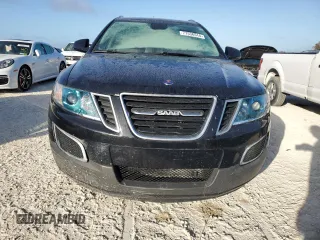 2011 Saab 9-4X z VIN 3G0FNPEYXBS800610, wystawiony jako Copart lot #77536514 z przebiegiem Nie podano mil oraz Szkoda całkowita • Salvage title. Historia ofert i sprzedaży dostępna na DreamBid. Obrazek 5.