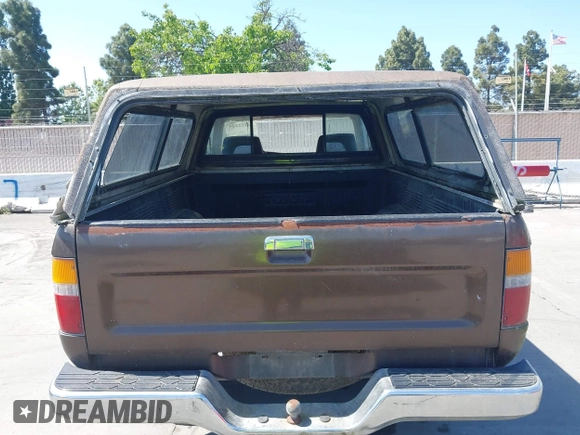 1989 Toyota Pickup DX with VIN JT4RN01PXK7010307, listed as a IAAI auction lot 42212229 with 389,623 mi miles and . Bid and sale history available at DreamBid. Image 8.