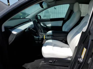 2021 Tesla Model Y Long Range with VIN 5YJYGDEEXMF070154, listed as a Copart auction lot 50742325 with 23,376 mi miles and Salvage Title. Bid and sale history available at carsss.com. Image 7.