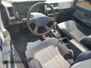 1991 Nissan Hardbody with VIN 1N6HD16S2MC396567, listed as a Copart auction lot 61949045 with 47,930 mi miles and Salvage title. Bid and sale history available at DreamBid. Image 8.