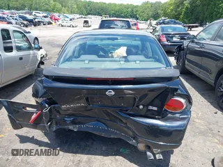 2002 Nissan Maxima GXE z VIN JN1DA31DX2T411198, wystawiony jako IAAI lot #42188090 z przebiegiem Nie podano mil oraz . Historia ofert i sprzedaży dostępna na DreamBid. Obrazek 16.