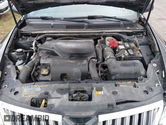 2011 Lincoln MKS EcoBoost with VIN 1LNHL9FTXBG600398, listed as a IAAI auction lot 42047512 with 114,274 mi miles and . Bid and sale history available at DreamBid. Image 10.