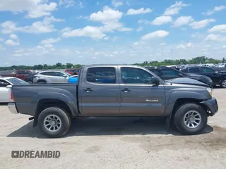 2011 Toyota Tacoma with VIN 5TFJX4GN7BX004212, listed as a IAAI auction lot 42590852 with 153,403 mi miles and . Bid and sale history available at DreamBid. Image 14.