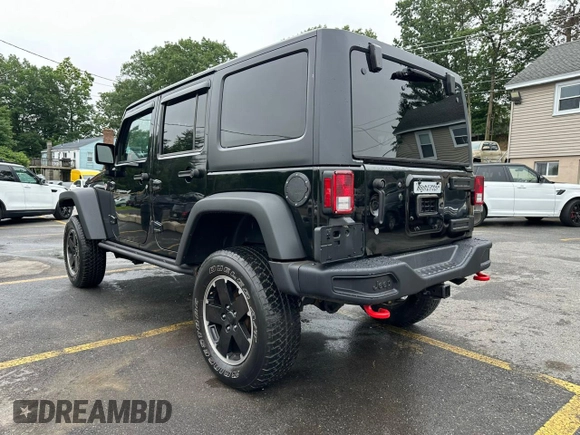2015 Jeep Wrangler Unlimited Rubicon z VIN 1C4BJWFG2FL541572, wystawiony jako Copart lot #61723875 z przebiegiem 163 169 mil mil oraz Czysty tytuł • Clean title. Historia ofert i sprzedaży dostępna na DreamBid. Obrazek 2.