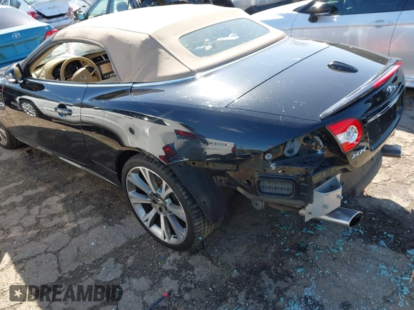 2014 Jaguar XK with VIN SAJWA4GB0ELB52358, listed as a IAAI auction lot 41832850 with 93,037 mi miles. Bid and sale history available at carsss.com. Image 3.