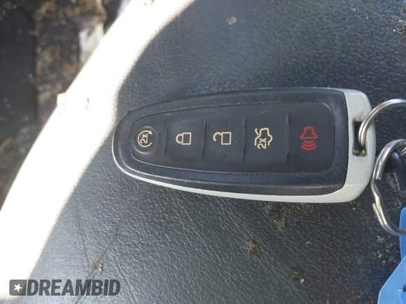 2015 Ford Escape Titanium with VIN 1FMCU9J94FUC33962, listed as a IAAI auction lot 41990795 with Not provided miles and . Bid and sale history available at DreamBid. Image 11.
