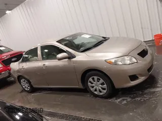 2010 Toyota Corolla with VIN 1NXBU4EE0AZ271333, listed as a IAAI auction lot 42308815 with 99,649 mi miles and . Bid and sale history available at DreamBid. Image 13.