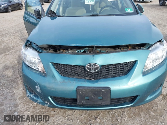2009 Toyota Corolla with VIN JTDBL40E29J017358, listed as a IAAI auction lot 41041604 with 233,205 mi miles. Bid and sale history available at carsss.com. Image 6.