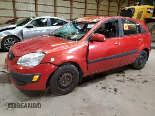 2009 Kia Rio LX with VIN KNADE243696572877, listed as a Copart auction lot 66075394 with 0 mi miles and Non Repairable. Bid and sale history available at carsss.com. Image 1.