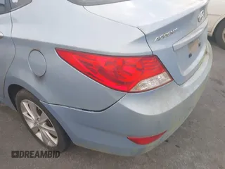 2013 Hyundai Accent GLS with VIN KMHCU4AE8DU583303, listed as a IAAI auction lot 42504235 with 113,992 mi miles and . Bid and sale history available at DreamBid. Image 6.
