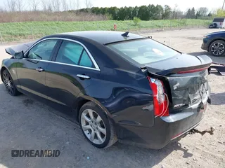 2014 Cadillac ATS Standard AWD with VIN 1G6AG5RX6E0105293, listed as a IAAI auction lot 42142760 with 138,313 mi miles and . Bid and sale history available at DreamBid. Image 3.