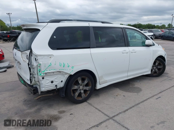 2011 Toyota Sienna SE with VIN 5TDXK3DC1BS069696, listed as a IAAI auction lot 41976857 with 160,994 mi miles. Bid and sale history available at carsss.com. Image 4.
