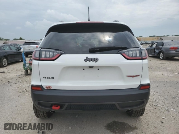 2022 Jeep Cherokee Trailhawk z VIN 1C4PJMBX2ND548837, wystawiony jako Copart lot #59042215 z przebiegiem 13 489 mil mil oraz Szkoda całkowita • Salvage title. Historia ofert i sprzedaży dostępna na DreamBid. Obrazek 6.