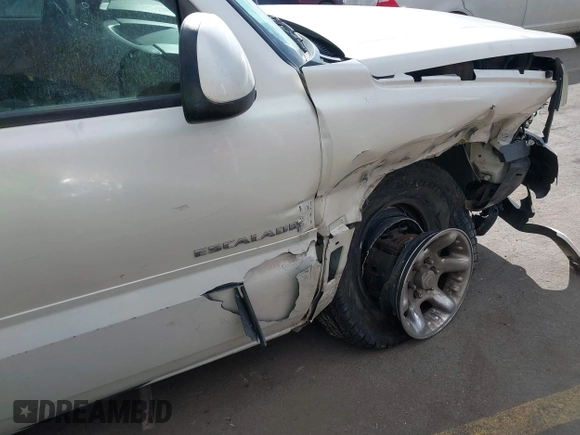 2003 Cadillac Escalade z VIN 1GYEK63N53R304400, wystawiony jako IAAI lot #41544697 z przebiegiem 207 913 mil mil oraz . Historia ofert i sprzedaży dostępna na DreamBid. Obrazek 13.