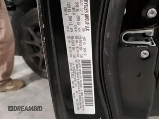 2014 Dodge Journey R/T z VIN 3C4PDCEG1ET167567, wystawiony jako Copart lot #45019695 z przebiegiem 133 095 mil mil oraz Szkoda całkowita • Salvage title. Historia ofert i sprzedaży dostępna na DreamBid. Obrazek 16.