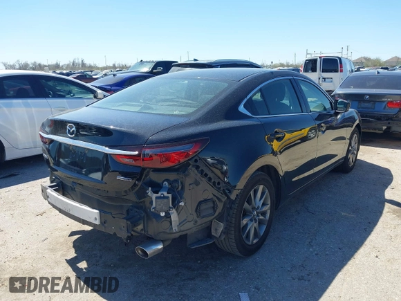 2020 Mazda 6 Sport with VIN JM1GL1UM2L1519932, listed as a IAAI auction lot 41712367 with 83,497 mi miles and . Bid and sale history available at DreamBid. Image 4.