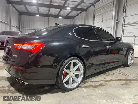 2014 Maserati Ghibli S Q4 z VIN ZAM57RTA9E1112724, wystawiony jako Copart lot #73739204 z przebiegiem 45 525 mil mil oraz Szkoda całkowita • Salvage title. Historia ofert i sprzedaży dostępna na DreamBid. Obrazek 4.