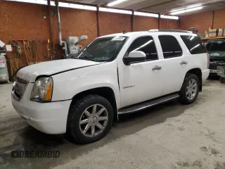 2013 GMC Yukon Denali with VIN 1GKS2EEF1DR319491, listed as a Copart auction lot 51065985 with 179,553 mi miles and Salvage Title. Bid and sale history available at carsss.com. Image 1.