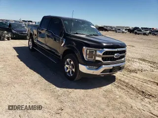 2022 Ford F-150 XL z VIN 1FTFW1ED9NFA27230, wystawiony jako Copart lot #57282795 z przebiegiem 20 200 mil mil oraz Szkoda całkowita • Salvage title. Historia ofert i sprzedaży dostępna na DreamBid. Obrazek 13.