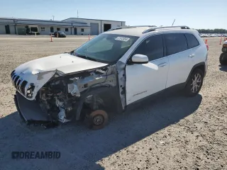 2015 Jeep Cherokee Latitude z VIN 1C4PJMCS3FW588837, wystawiony jako Copart lot #57912055 z przebiegiem 171 691 mil mil oraz Czysty tytuł • Clean title. Historia ofert i sprzedaży dostępna na DreamBid. Obrazek 1.