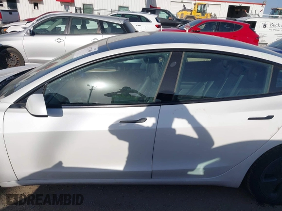 2023 Tesla Model 3 with VIN 5YJ3E1EAXPF436212, listed as a IAAI auction lot 41727400 with 81,011 mi miles and . Bid and sale history available at carsss.com. Image 14.
